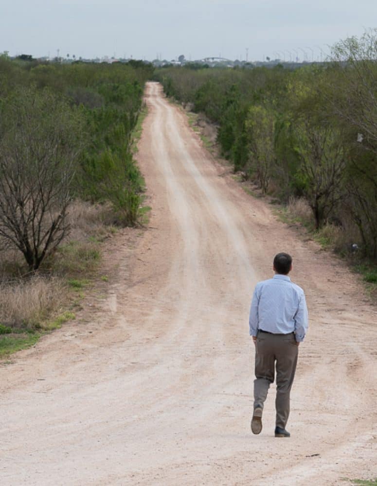 Jay Timmons walks along U.S. - Mexico Border
