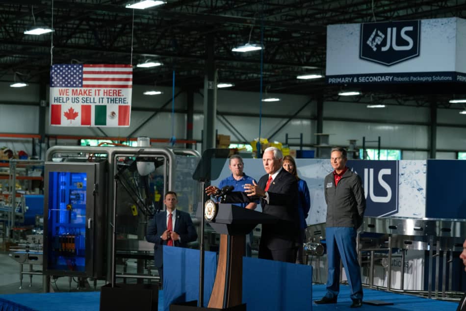 Flanked by NAM President and CEO Jay Timmons, Vice President Mike Pence speaks about the importance of the USMCA for manufacturers in the United States.